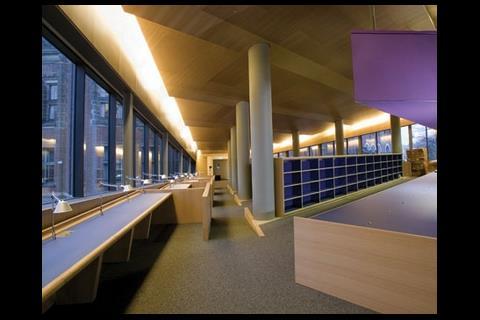 The reading room is divided into separate study areas by a saw-toothed ceiling